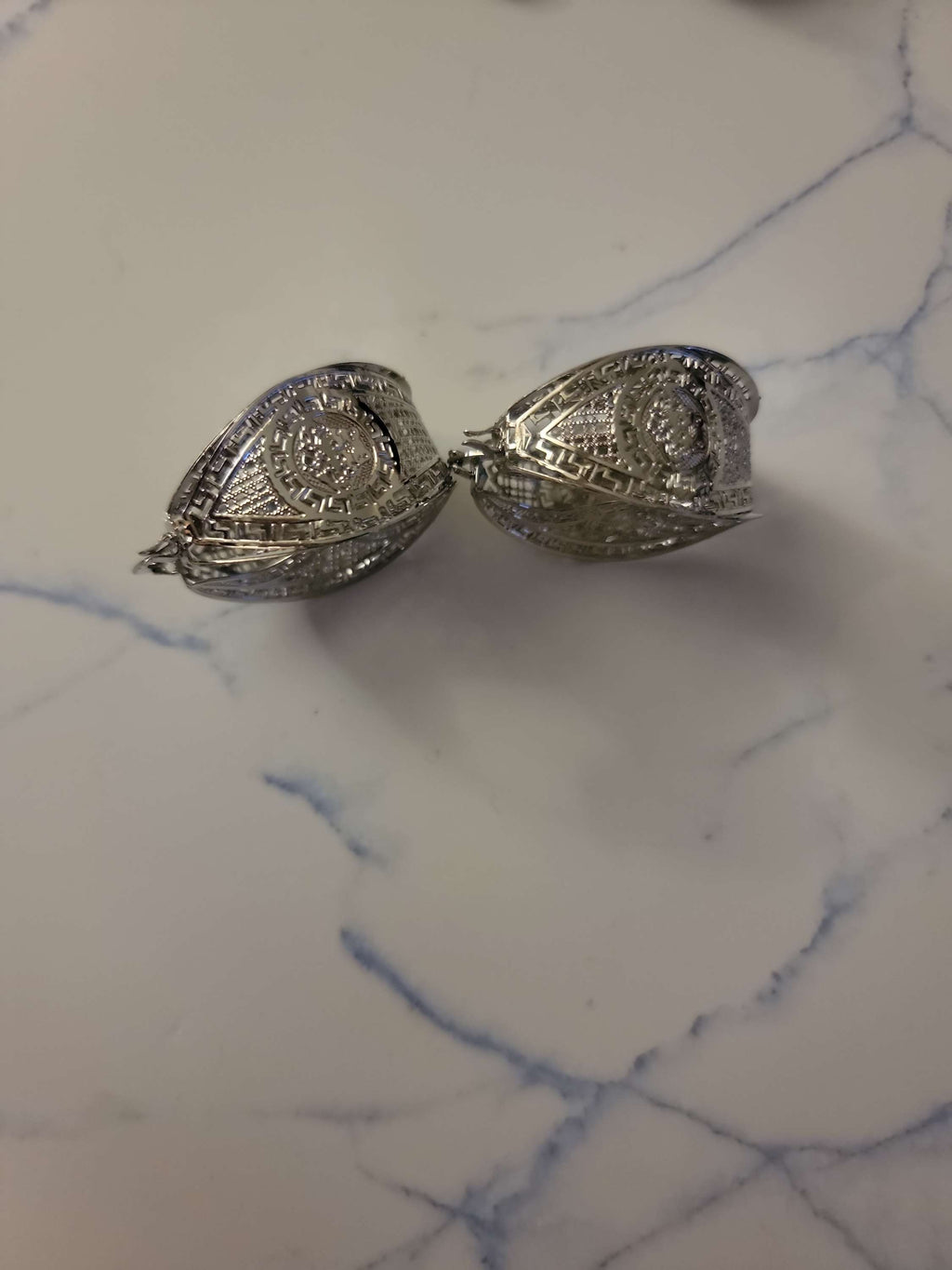 V lady hoop earring image 1