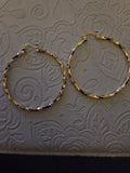 Gold twirl hoops